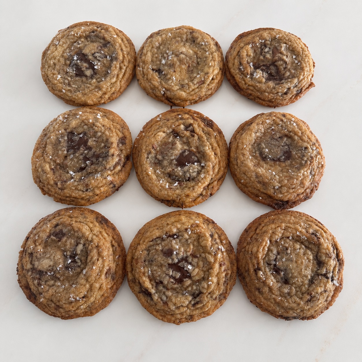 Brown butter chocolate chip cookies with flaky salt and pooled chocolate